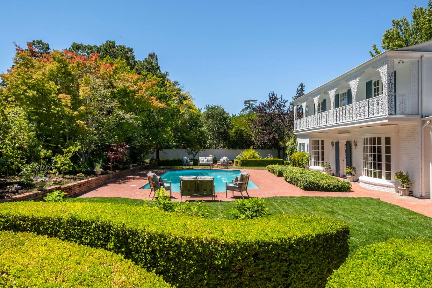 7 Windsor Drive Hillsborough, CA 94010 - Photo 40 of 57 a view of a house with a yard patio and swimming pool