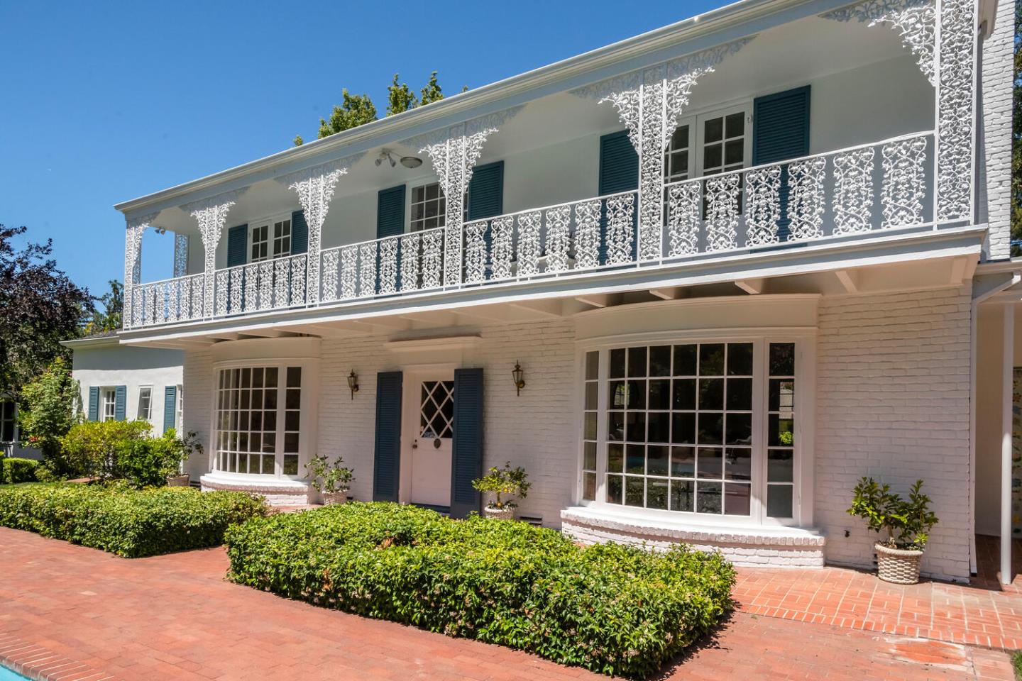 7 Windsor Drive Hillsborough, CA 94010 - Photo 43 of 57 a front view of a house with a yard