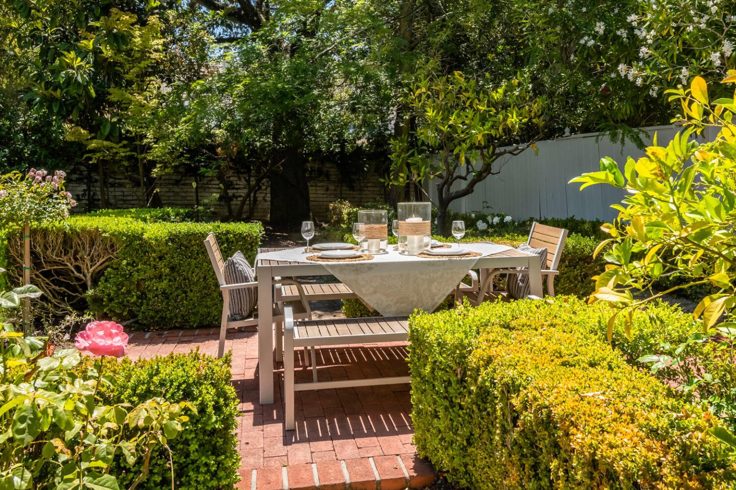 7 Windsor Drive Hillsborough, CA 94010 - Photo 45 of 57 a view of a patio with table and chairs and potted plants