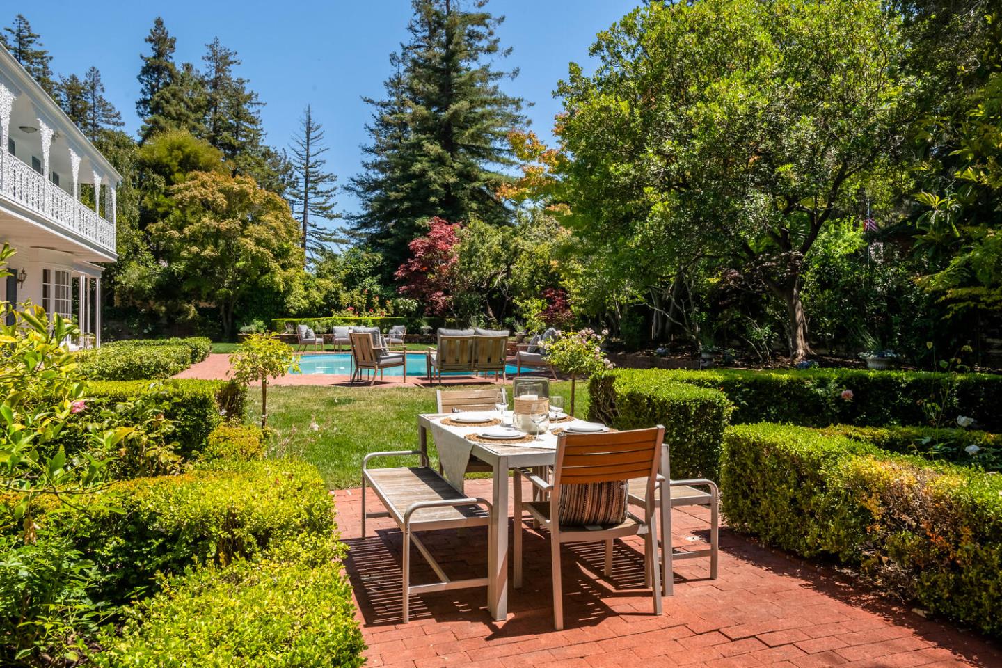 7 Windsor Drive Hillsborough, CA 94010 - Photo 46 of 57 a view of a chairs and table in the garden