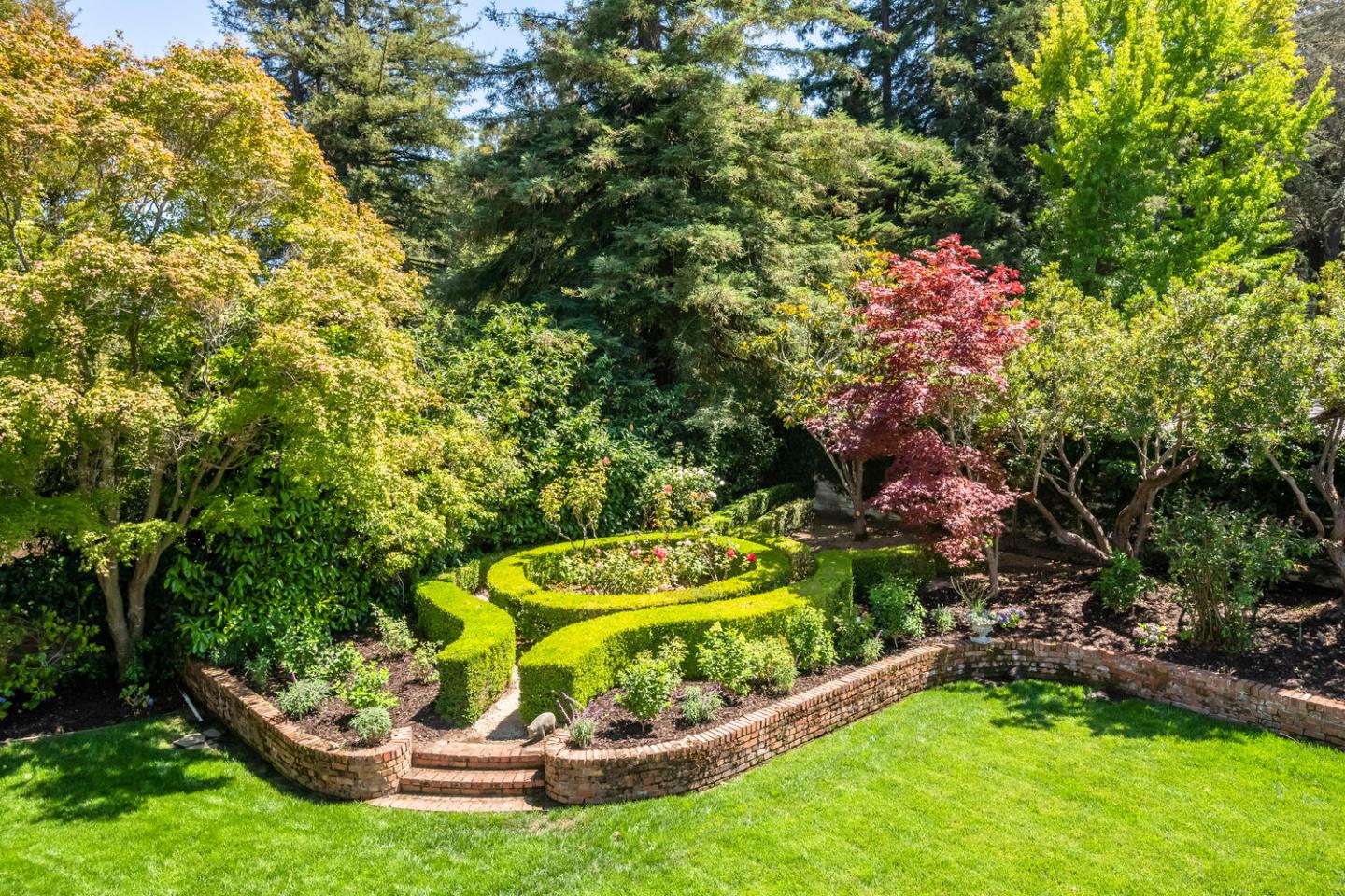 7 Windsor Drive Hillsborough, CA 94010 - Photo 51 of 57 a view of a swimming pool with a garden