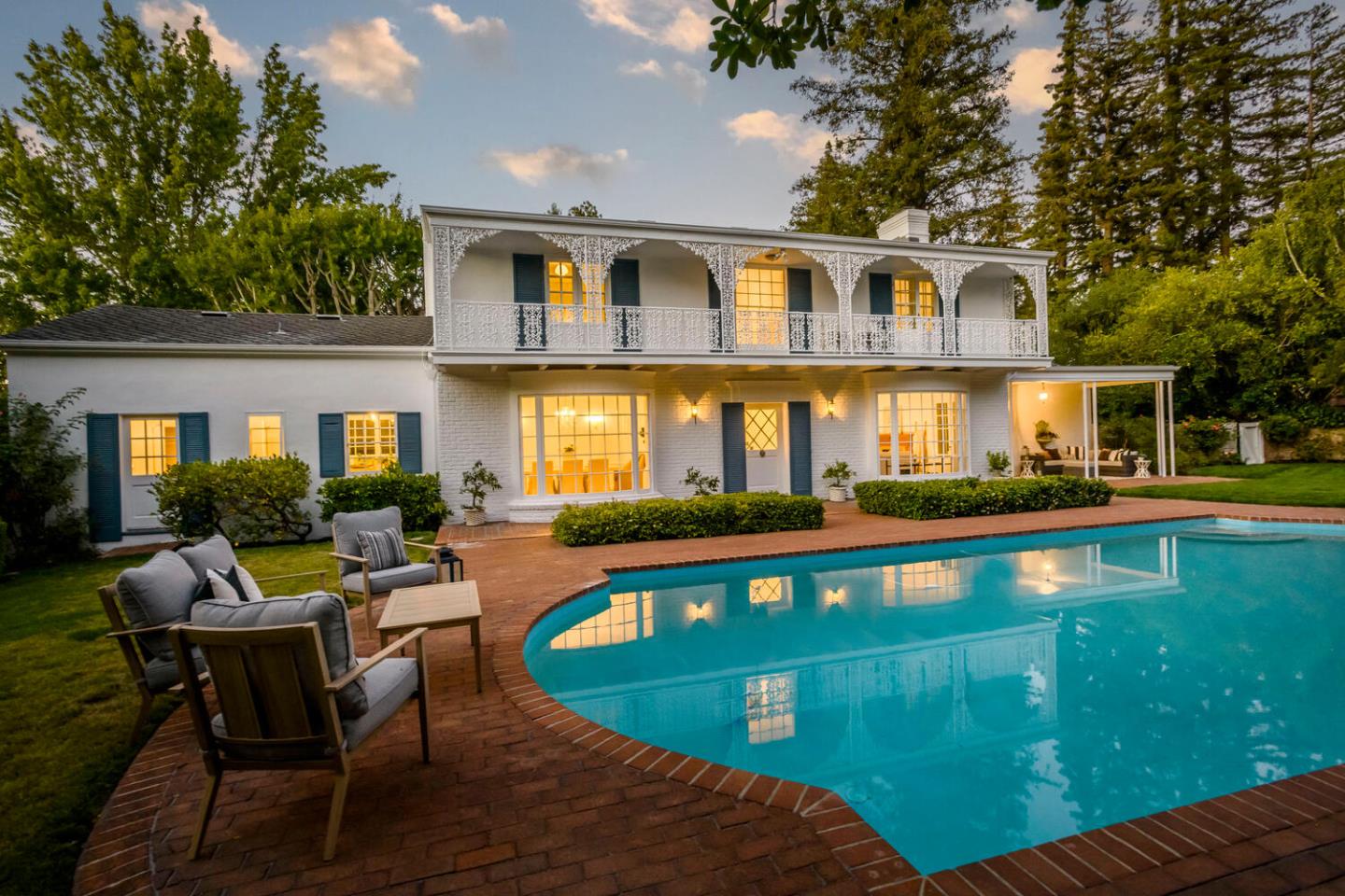 7 Windsor Drive Hillsborough, CA 94010 - Photo 55 of 57 a view of house with swimming pool outdoor seating area and furniture