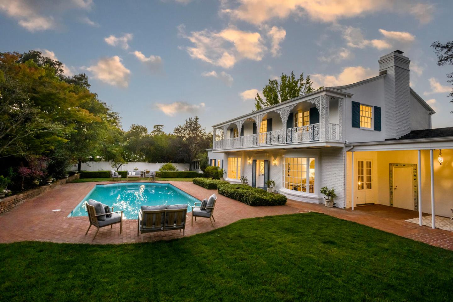 7 Windsor Drive Hillsborough, CA 94010 - Photo 56 of 57 a front view of a house with swimming pool having outdoor seating