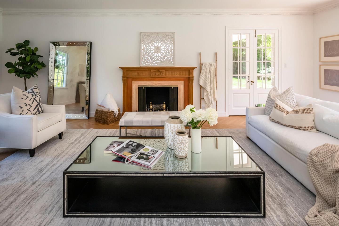 7 Windsor Drive Hillsborough, CA 94010 - Photo 7 of 57 a living room with furniture a large window and a fireplace