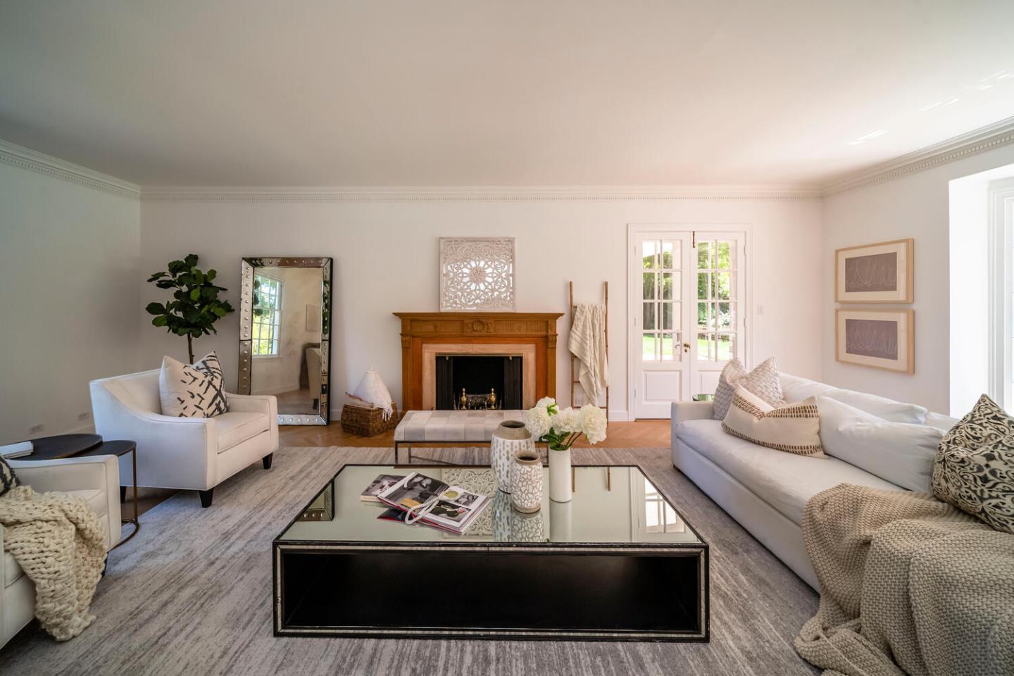 7 Windsor Drive Hillsborough, CA 94010 - Photo 10 of 57 a living room with furniture and a fireplace