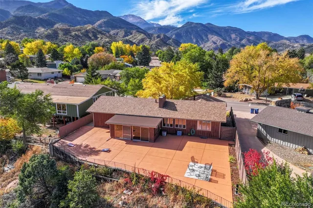an aerial view of residential house with outdoor space
