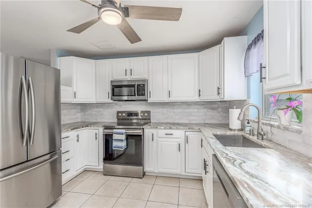 a patio with patio outdoor seating and yard