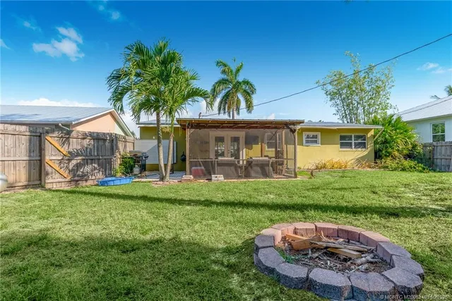 a view of a house with a big yard