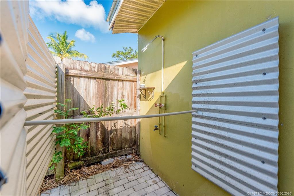 3156 Southeast Mimosa Street Stuart, FL 34997 - Photo 26 of 38 Outdoor Shower w/ Hot Water