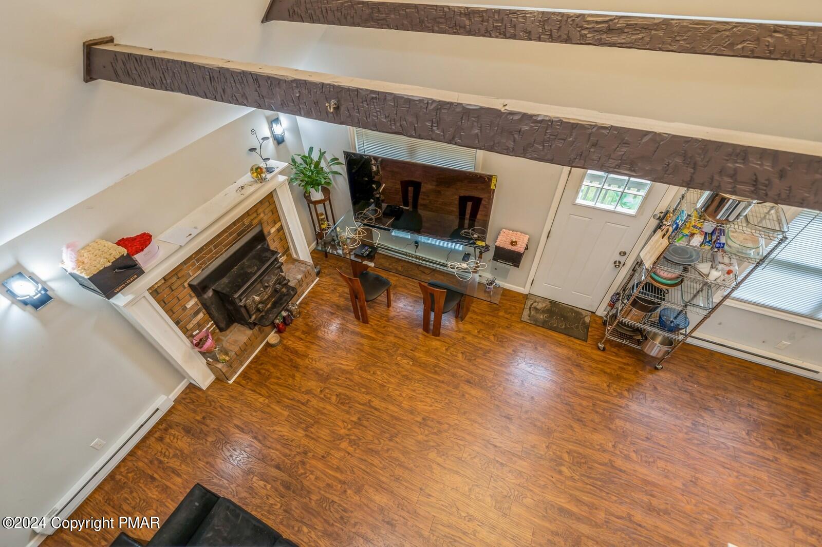 104 Swan Drive Dingmans Ferry, PA 18328 - Photo 24 of 36 a living room with a patio