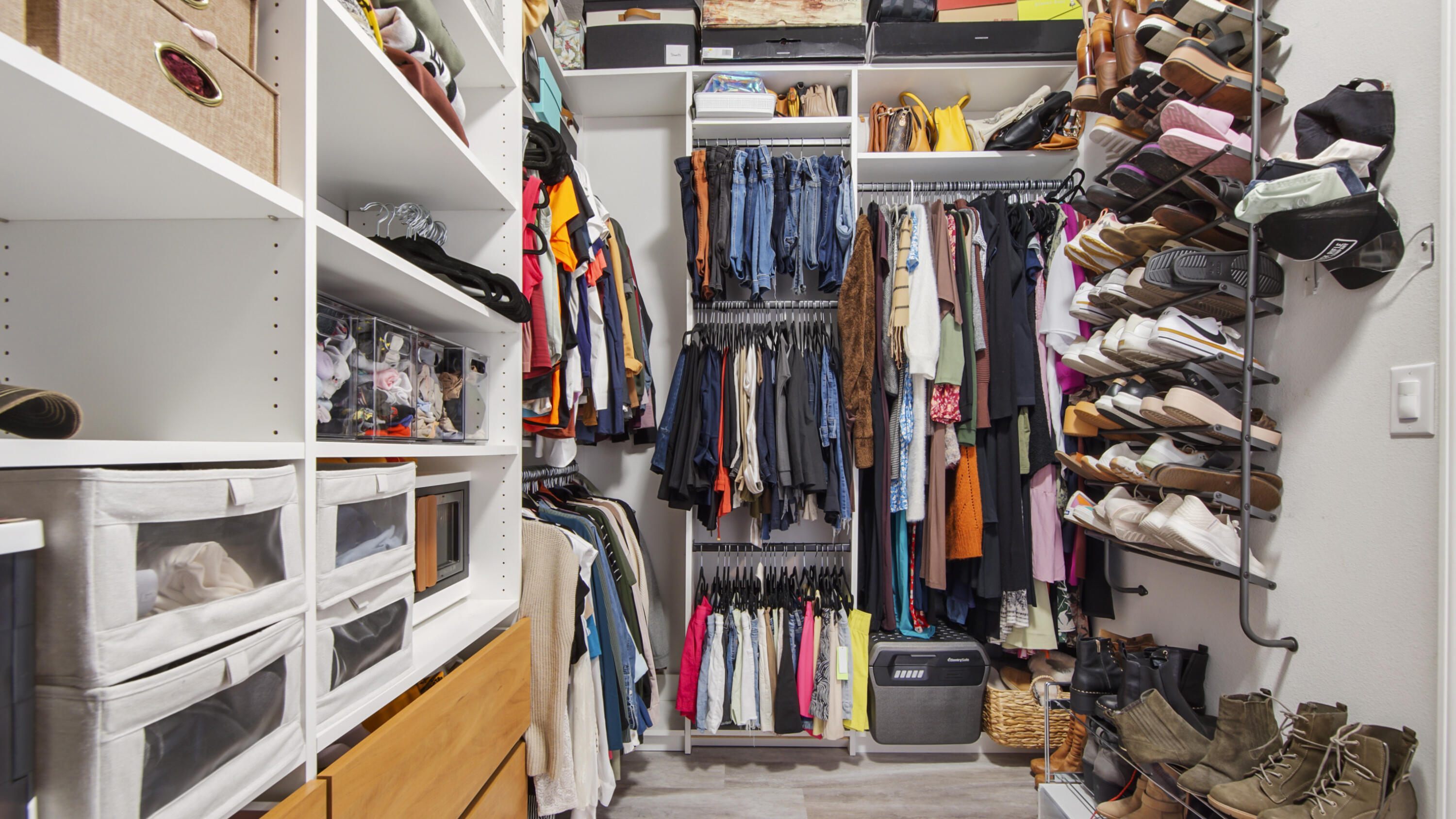 38 Norwich Road Freeport, FL 32439 - Photo 19 of 42 a view of walk in closet with clothes and shoes