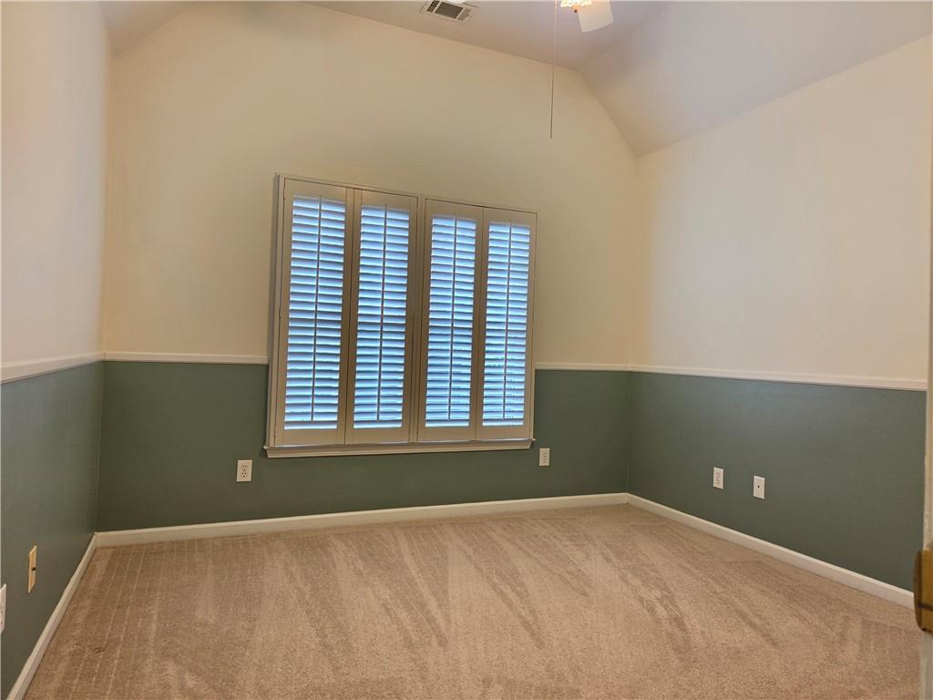 3715 Ridgeside Court Suwanee, GA 30024 - Photo 22 of 44 an empty room with a window