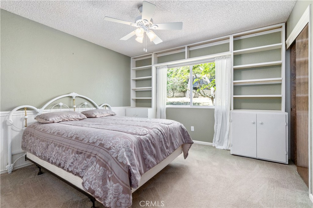 4530 San Ardo Avenue Atascadero, CA 93422 - Photo 16 of 37 a bedroom with a bed and a window