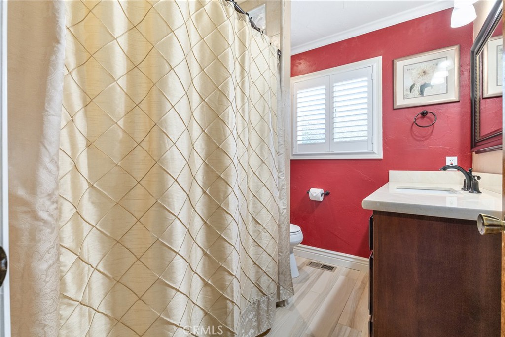 4530 San Ardo Avenue Atascadero, CA 93422 - Photo 19 of 37 a bathroom with a sink and a mirror