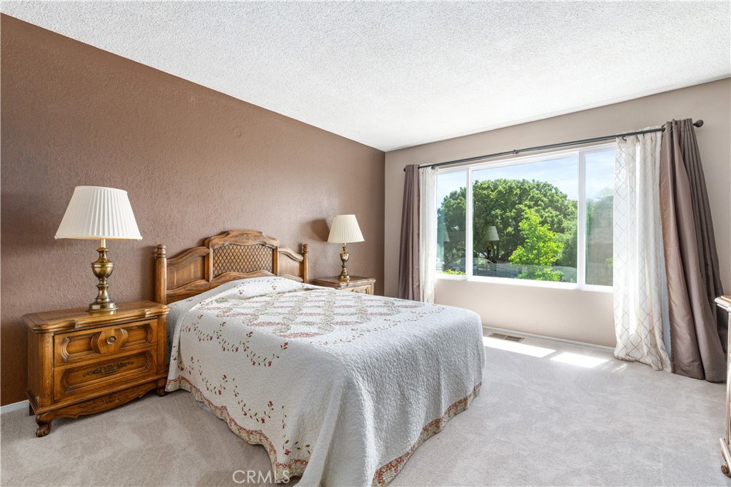 4530 San Ardo Avenue Atascadero, CA 93422 - Photo 20 of 37 a bedroom with a bed and a window