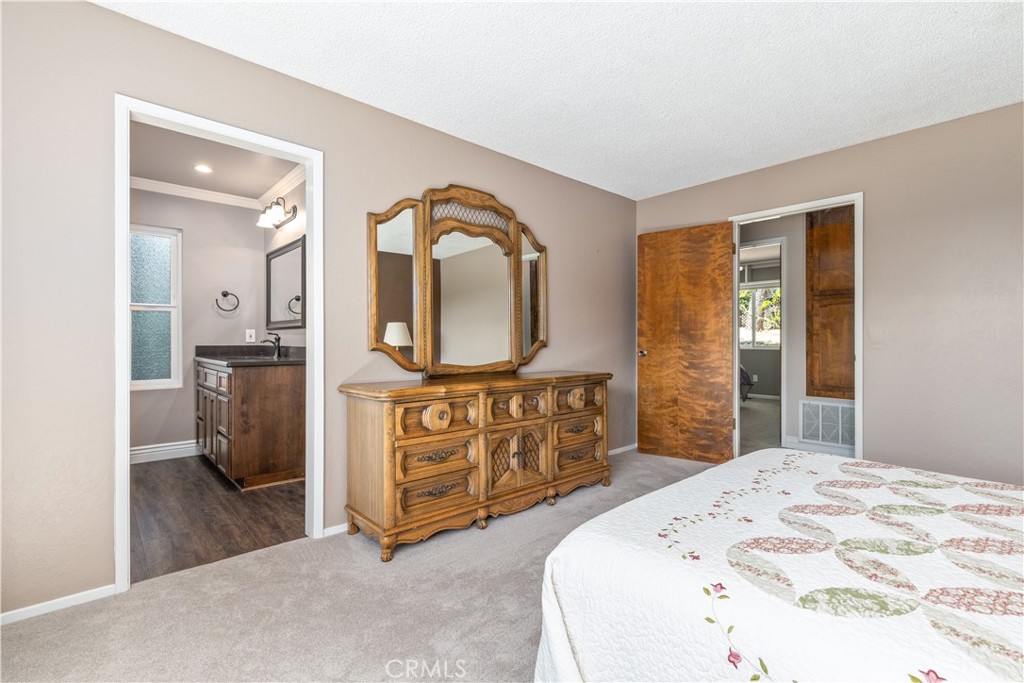 4530 San Ardo Avenue Atascadero, CA 93422 - Photo 21 of 37 a spacious bedroom with a bed and a dresser