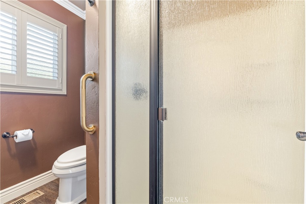 4530 San Ardo Avenue Atascadero, CA 93422 - Photo 24 of 37 a white toilet sitting next to a small bathroom