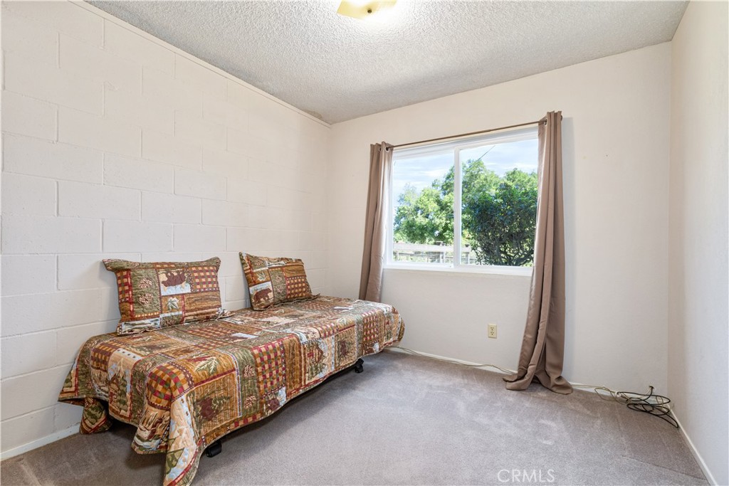 4530 San Ardo Avenue Atascadero, CA 93422 - Photo 26 of 37 a bedroom with a bed and window