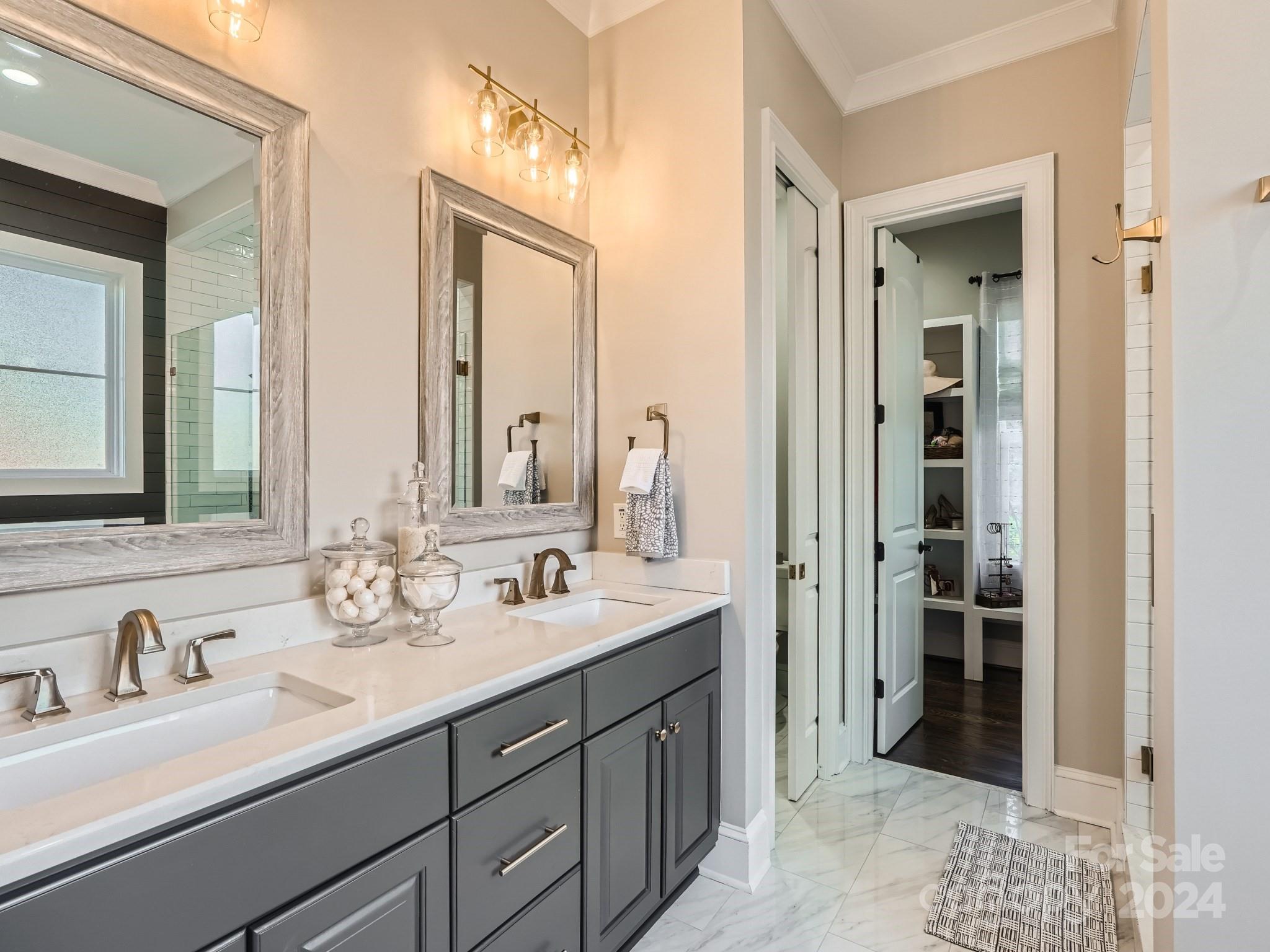 2926 Dodsworth Drive Cramerton, NC 28032 - Photo 14 of 33 a bathroom with double vanity sinks and a mirror