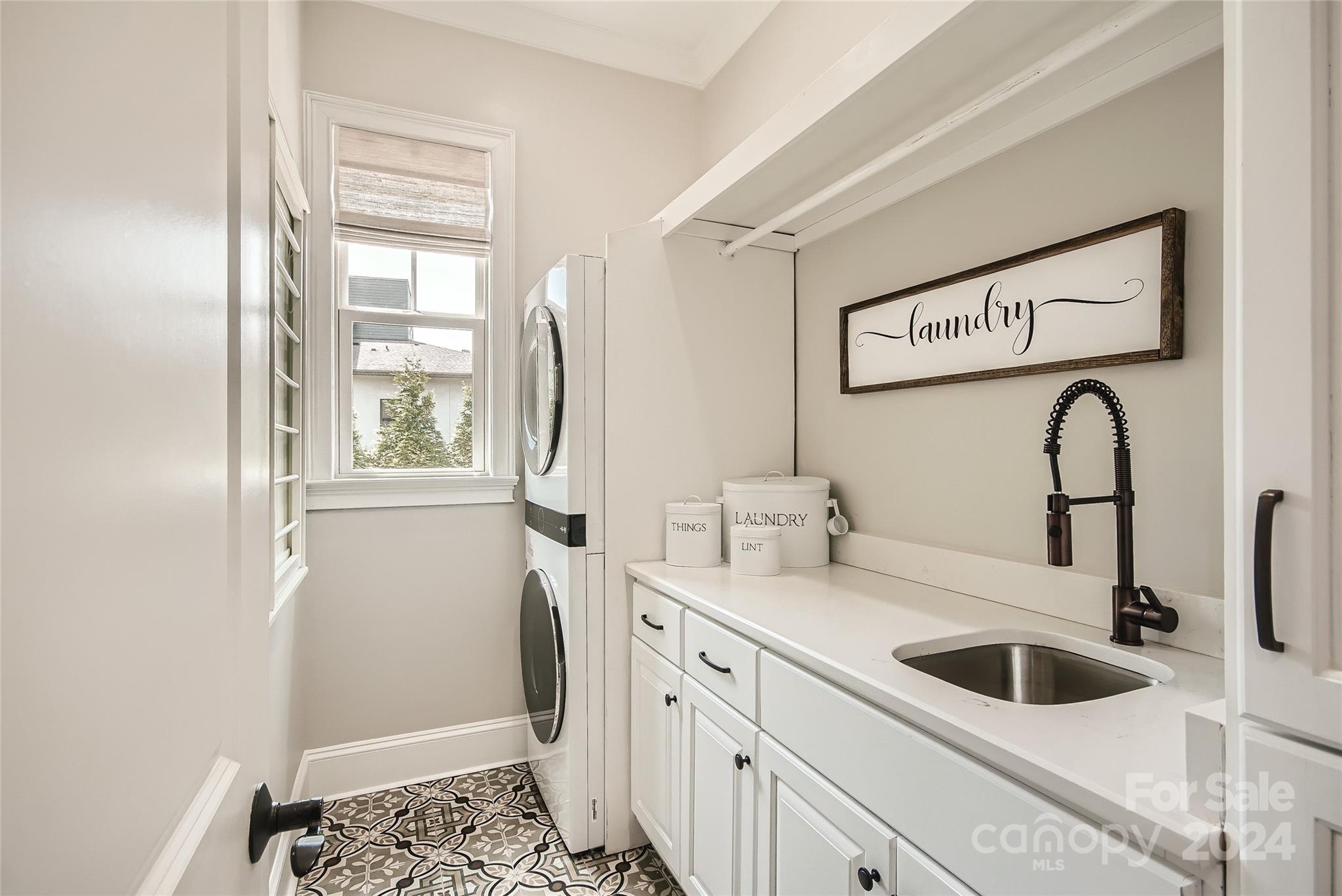 2926 Dodsworth Drive Cramerton, NC 28032 - Photo 19 of 33 a bathroom with a sink and a window