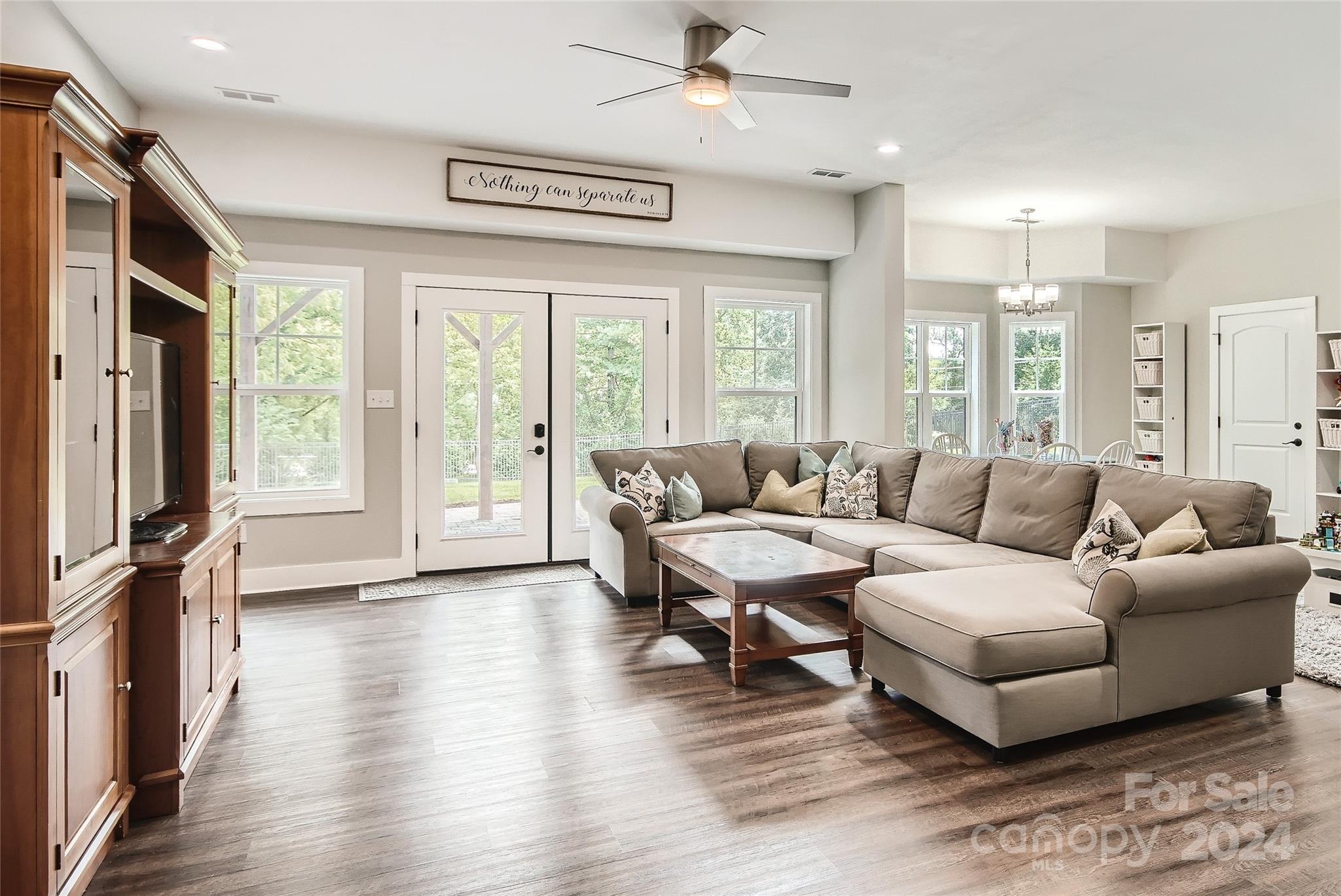 2926 Dodsworth Drive Cramerton, NC 28032 - Photo 25 of 33 a living room with furniture and a large window