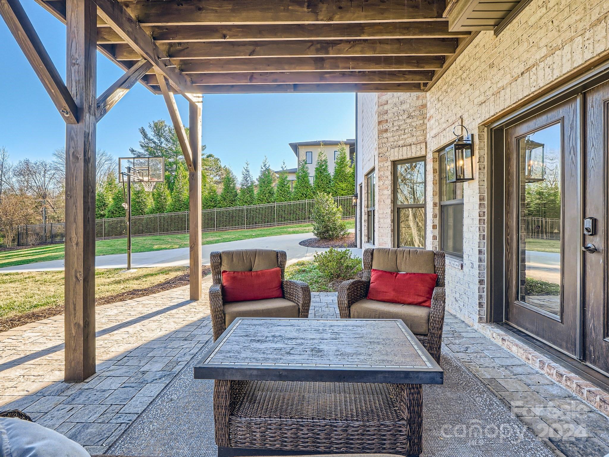 2926 Dodsworth Drive Cramerton, NC 28032 - Photo 31 of 33 a outdoor space with patio the couches and pool