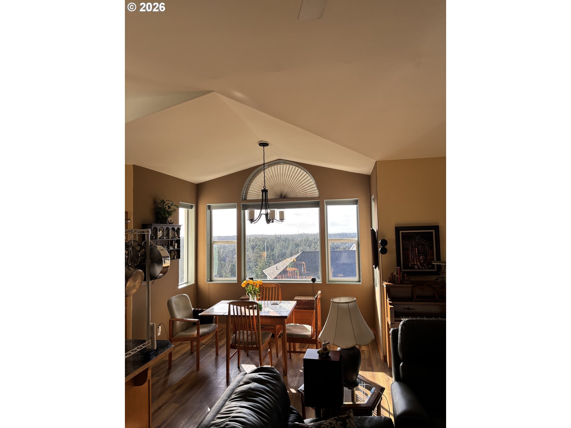 3520 Ocean View Drive Florence, OR 97439 - Photo 11 of 44 a view of a workspace with furniture and floor to ceiling window