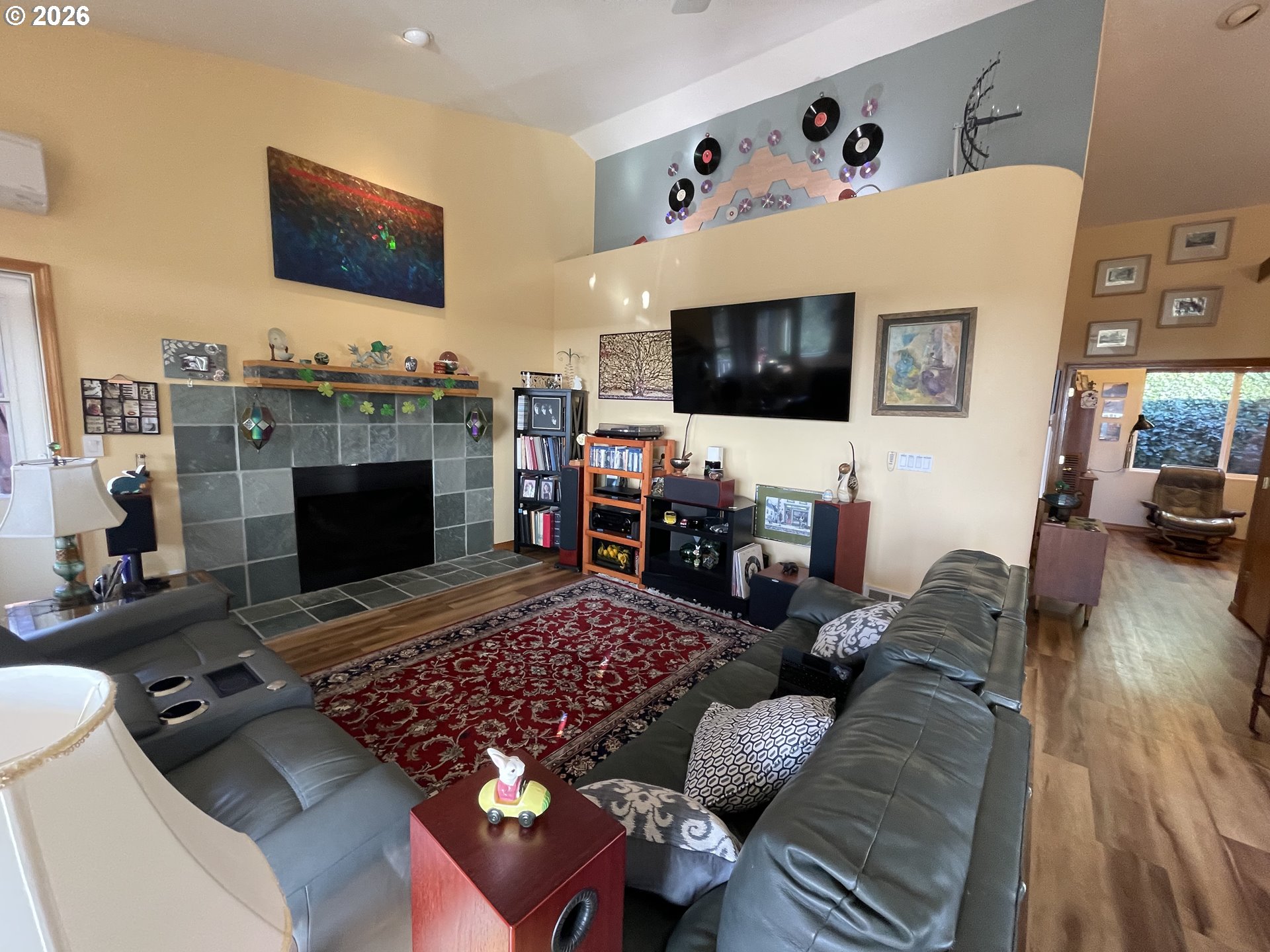 3520 Ocean View Drive Florence, OR 97439 - Photo 17 of 44 a living room with furniture and a flat screen tv