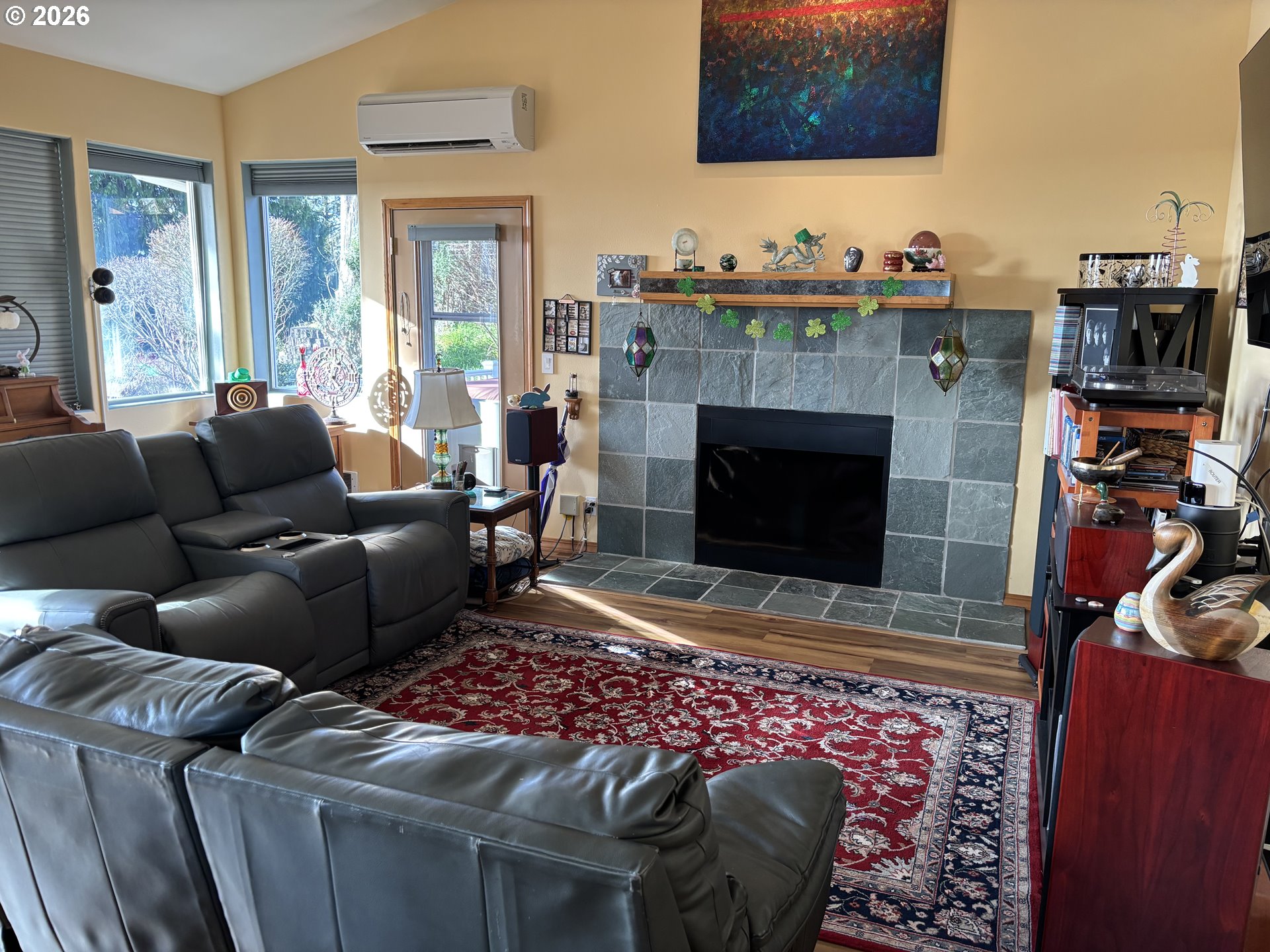 3520 Ocean View Drive Florence, OR 97439 - Photo 18 of 44 a living room with furniture and a fireplace