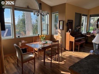 3520 Ocean View Drive Florence, OR 97439 - Photo 19 of 44 a view of a dining room with furniture window and wooden floor