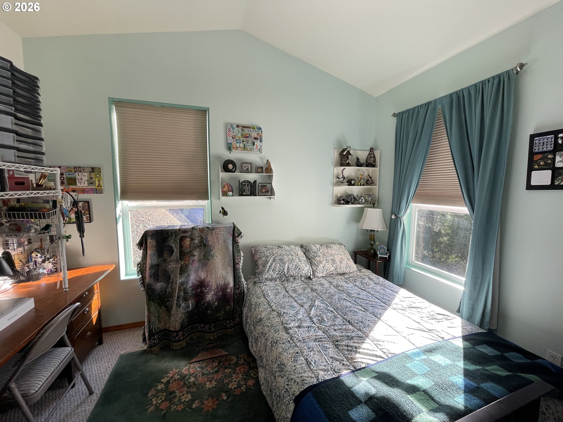 3520 Ocean View Drive Florence, OR 97439 - Photo 38 of 44 a bedroom with a bed and a window