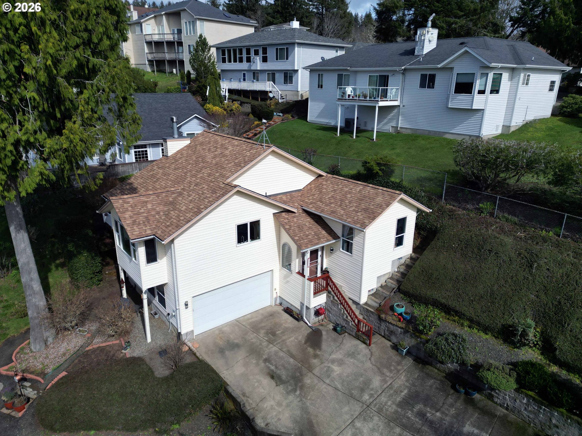 3520 Ocean View Drive Florence, OR 97439 - Photo 6 of 44 an aerial view of a house with a yard table and chairs