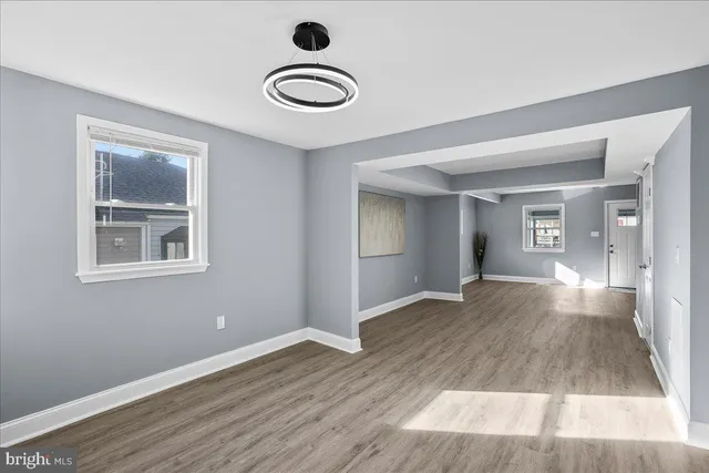 a view of livingroom with hardwood floor and hallway