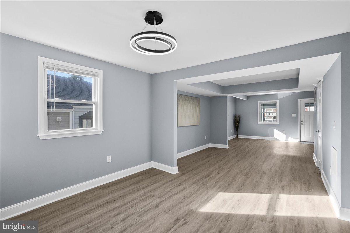57 Transverse Avenue Middle River, MD 21220 - Photo 18 of 35 a view of livingroom with hardwood floor and hallway