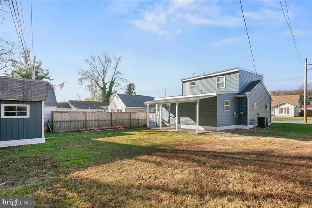 a big house with a big yard and more windows