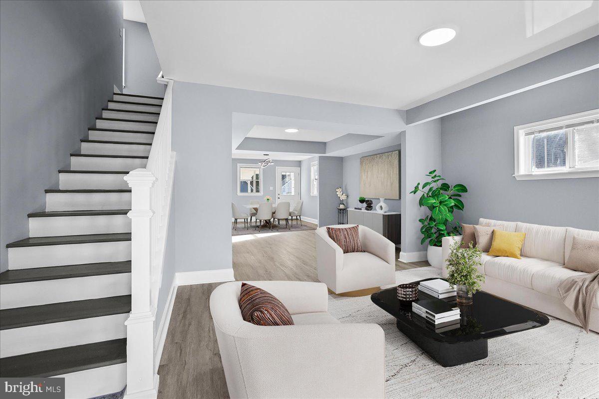 57 Transverse Avenue Middle River, MD 21220 - Photo 4 of 35 a living room with furniture and wooden floor