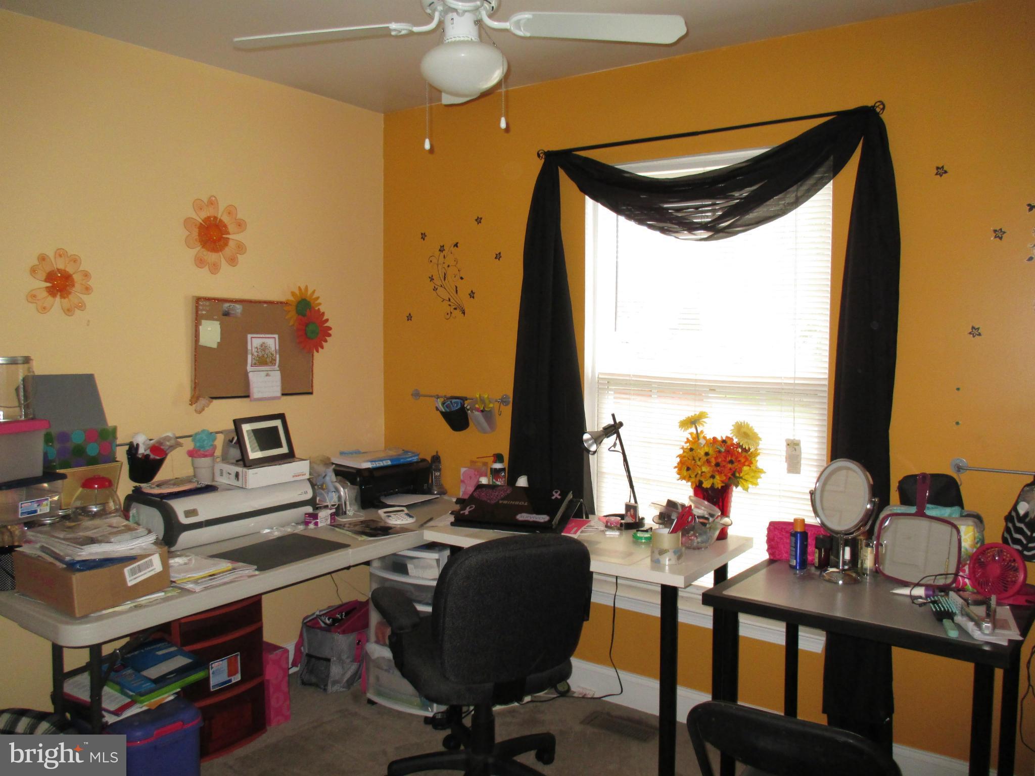 4032 Oak Road Halethorpe, MD 21227 - Photo 11 of 15 a view of a workspace with furniture and a window