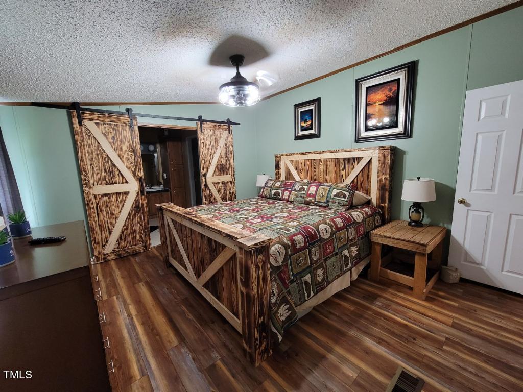 194 Waters Edge Road Henderson, NC 27537 - Photo 22 of 33 Master Bedroom