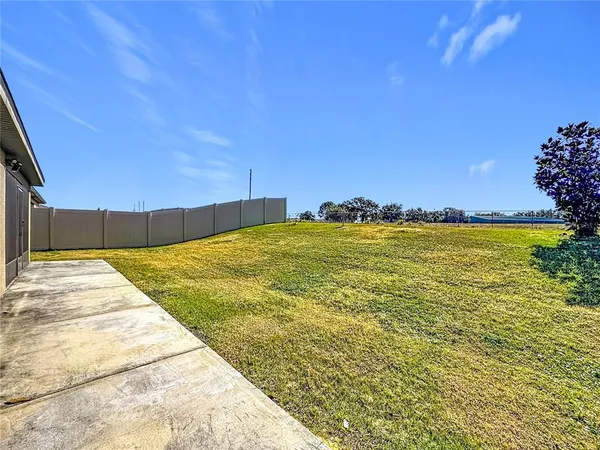 an aerial view of residential building with parking space