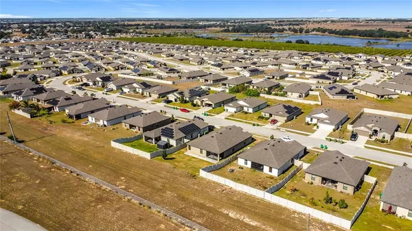 an aerial view of residential building with outdoor space
