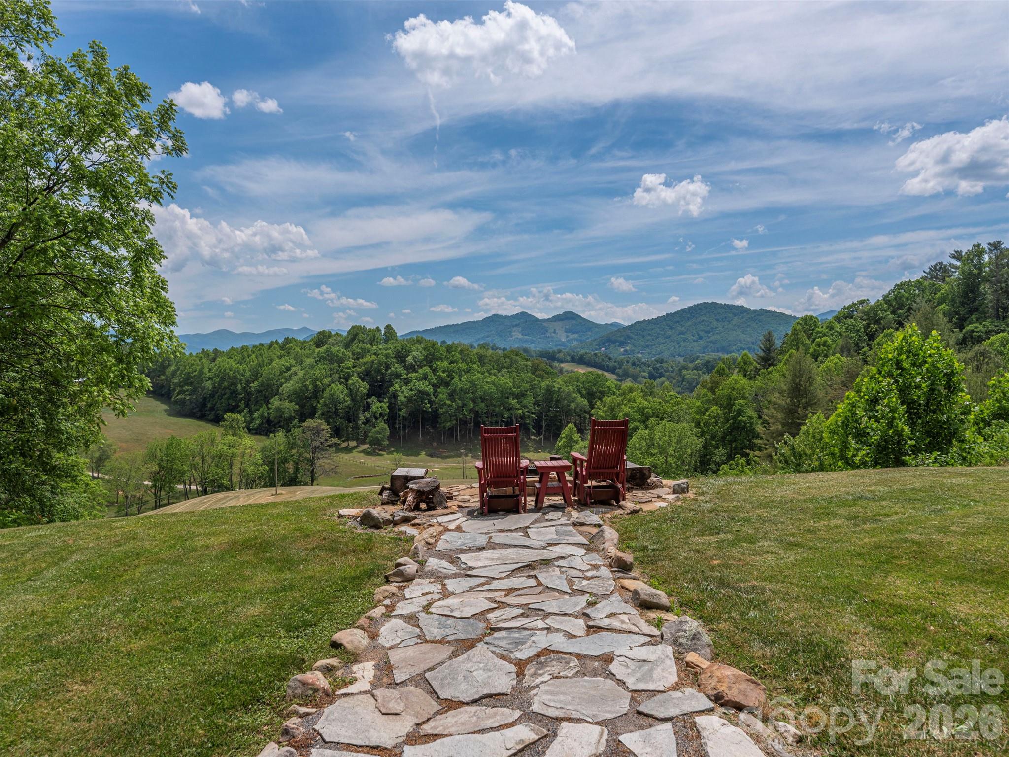 461 Ferguson Cove Loop Clyde, NC 28721 - Photo 38 of 46 a view of outdoor space yard and mountain view in back