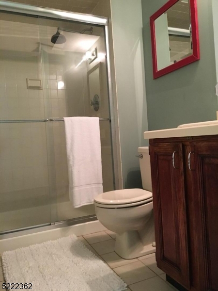 87 Highland Circle Berkeley Heights, NJ 07922 - Photo 11 of 11 a bathroom with a toilet and a shower