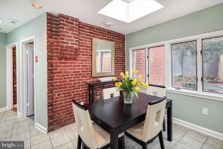 2113 37th Street Northwest Washington, DC 20007 - Photo 11 of 30 a dining room with furniture and window