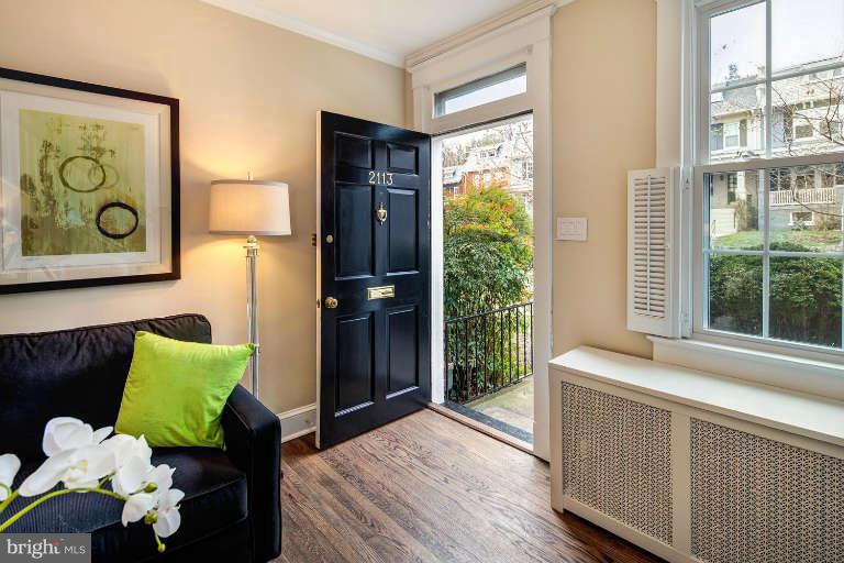 2113 37th Street Northwest Washington, DC 20007 - Photo 3 of 30 a bedroom with a bed and a window