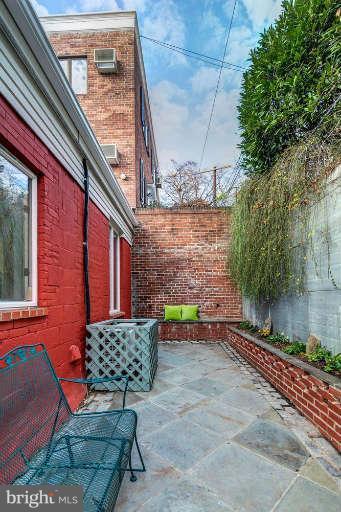 2113 37th Street Northwest Washington, DC 20007 - Photo 29 of 30 a couple of chairs and a table in patio