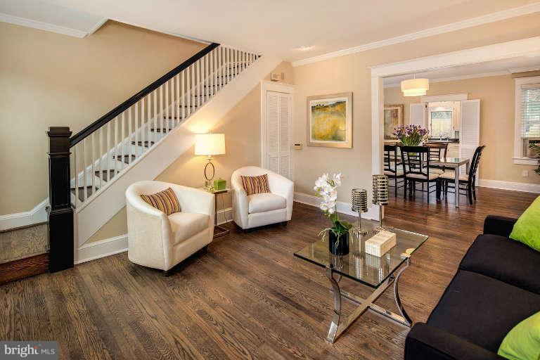 2113 37th Street Northwest Washington, DC 20007 - Photo 4 of 30 a living room with furniture and wooden floor