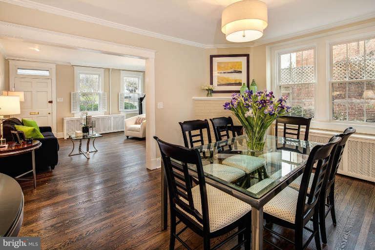 2113 37th Street Northwest Washington, DC 20007 - Photo 7 of 30 a view of a dining room with furniture window and wooden floor