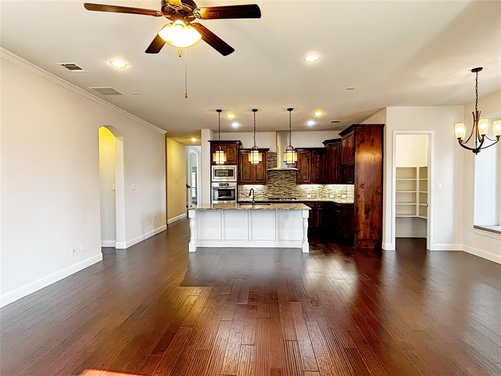 3037 Crestwater Ridge Keller, TX 76248 - Photo 9 of 25 a view of kitchen with sink and refrigerator