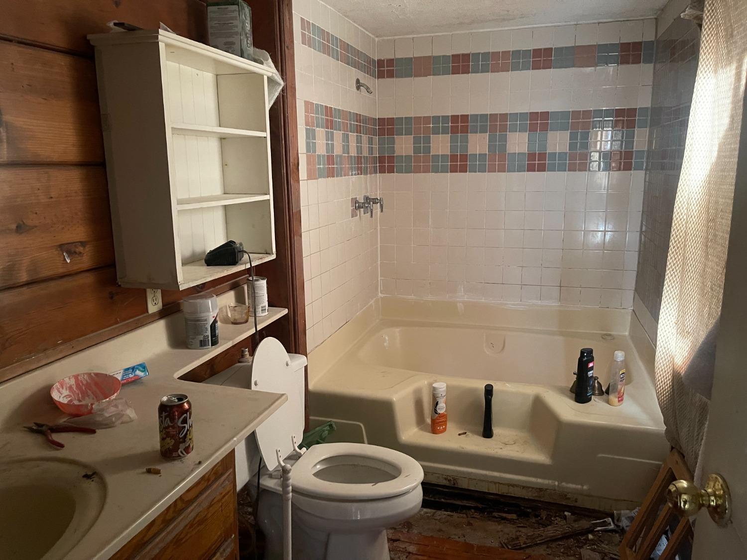 219 Hinchey Lane Colfax, CA 95713 - Photo 7 of 9 a bathroom with a sink toilet and shower