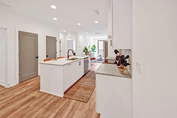 a living room with sink and furniture